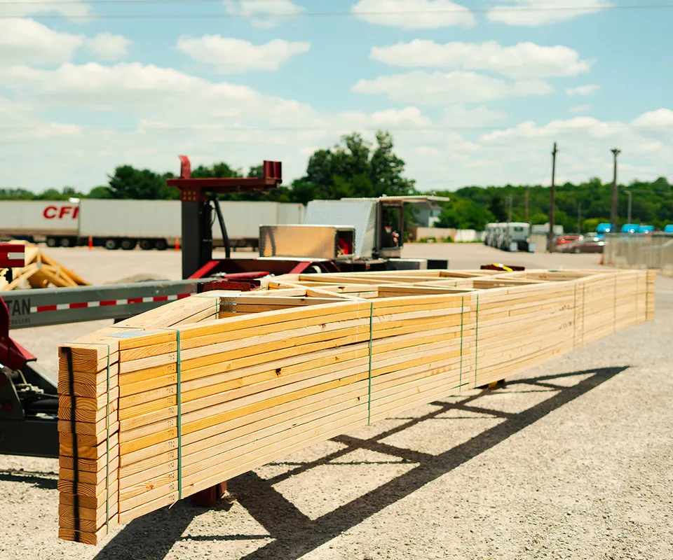 A bundled up stack of trusses ready for transportation